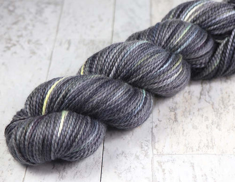 ABOVE THE EDGE: SW Merino / Stellina Sparkle - Hand dyed variegated fingering yarn
